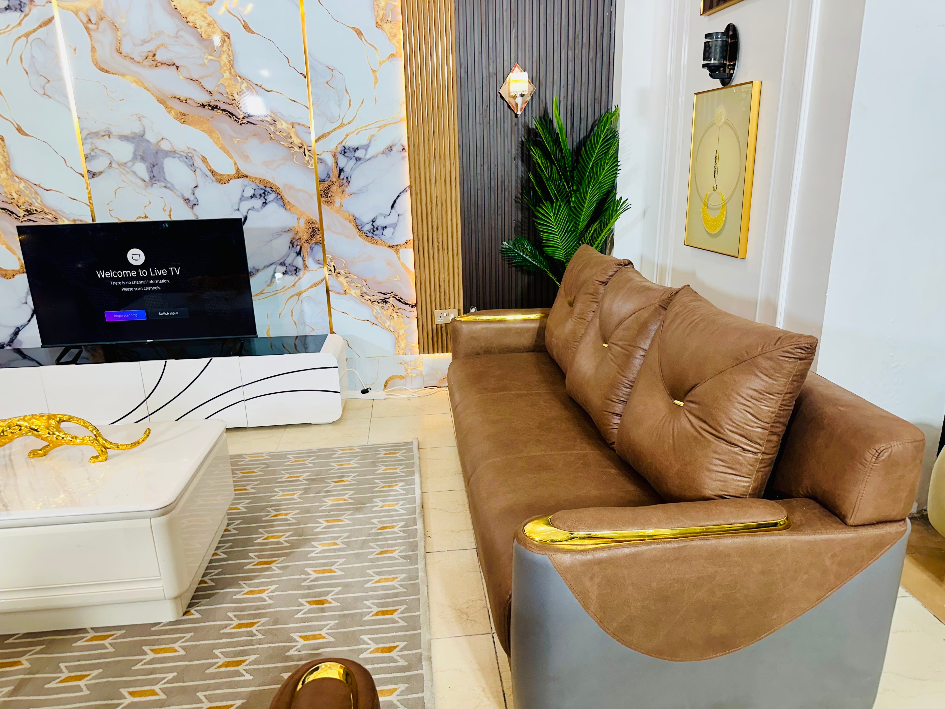 High-End Leather Sofa Set with Gold Accents